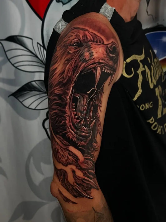 Big Black and Grey Bear on Men Arm Tattoo by @bootyfunkofficial
