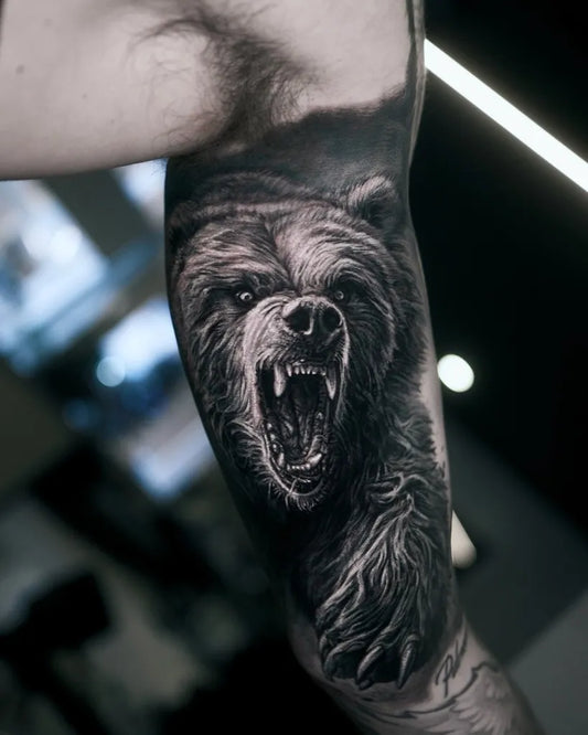 Big Black and Grey Bear on Men Arm Tattoo by @ink.shadow