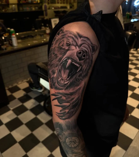 Big Black and Grey Bear on Men Arm Tattoo by @jeroenfiliustattoo