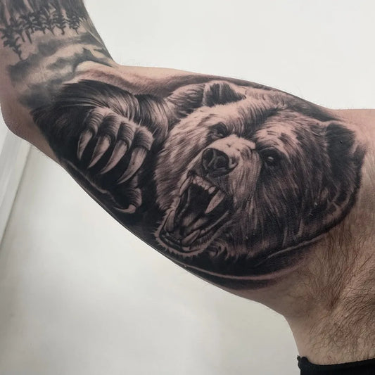 Big Black and Grey Bear on Men Arm Tattoo by @mantra___tattoo