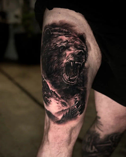 Big Black and Grey Bear with Mountains on Men Thigh Tattoo by @krisbarnastattoo