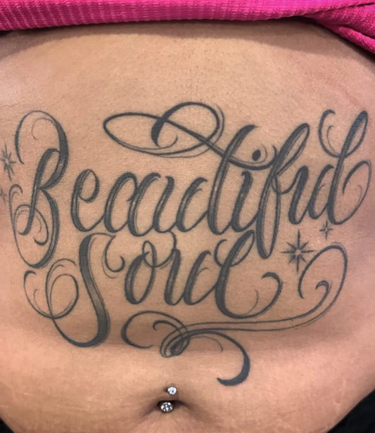 Big Black and Grey Beautiful Soul Script Tattoo on Women Stomach by @eachy_peachy