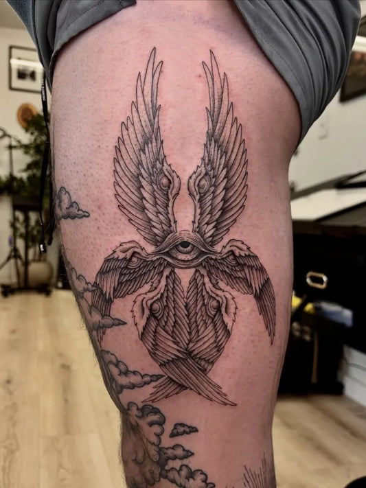 Big Black and Grey Biblically Accurate Angel Wings Eye on Men Thigh Tattoo by @madi.k_tattoo