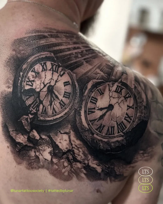 Big Black and Grey Broken Clocks Tattoo on Men Shoulder by @lunar.tattoo.society