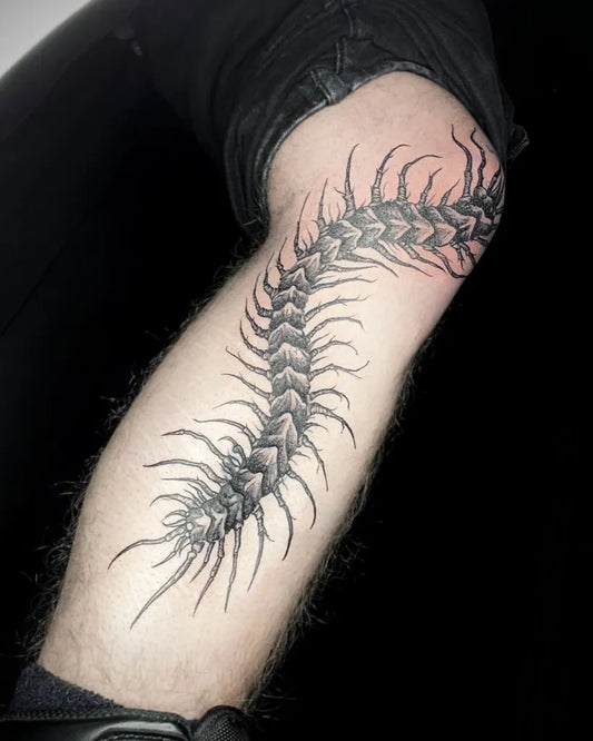 Big Black and Grey Centipede Tattoo on Men Leg by @amnezia.ink