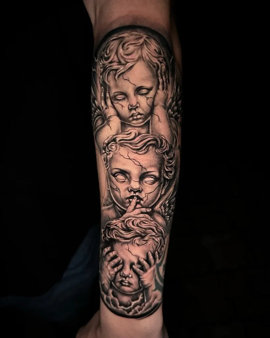 Big Black and Grey Cherubs Tattoo on Men Arm by @owlskullstudio
