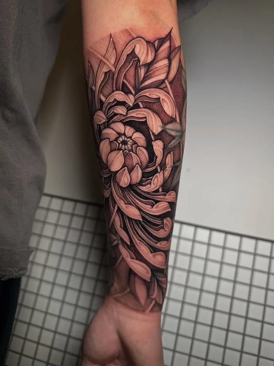 Big Black and Grey Chrysanthemum Tattoo on Men Arm by @alcantar.ttt