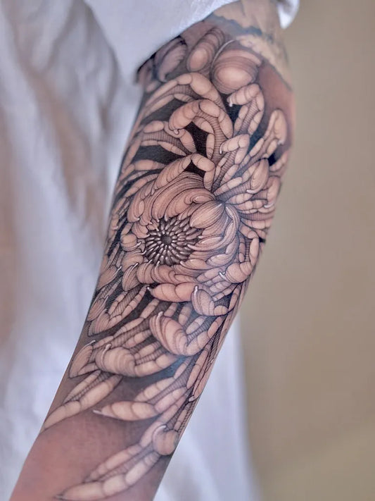 Big Black and Grey Chrysanthemum Tattoo on Women Arm by @dudutattooist