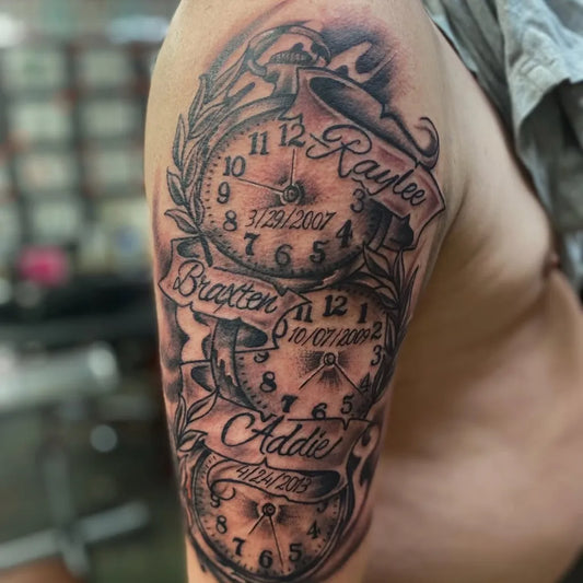 Big Black and Grey Clock Family Names Tattoo on Men Arm by @honkeytonk2267