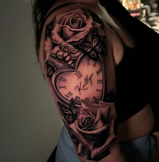 Big Black and Grey Clock Roses Butterflies Tattoo on Women Shoulder by @maddogtattz