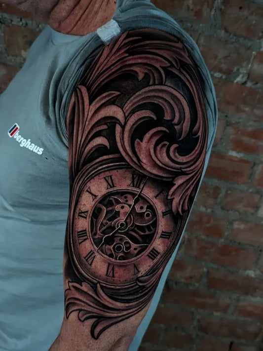 Big Black and Grey Clock and Floral Tattoo on Men Arm by @tyler.mcmahon.tattoo
