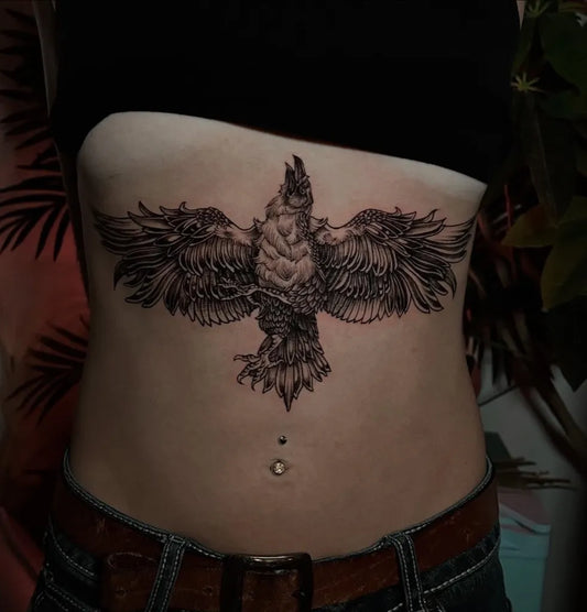 Big Black and Grey Cockatoo Crow Tattoo on Women Stomach by @bailey.tattoos