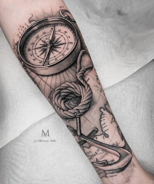 Big Black and Grey Compass Anchor Rope Nautical Tattoo on Men Arm by @morrzan_tattoo