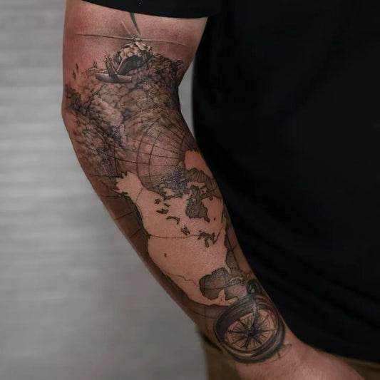 Big Black and Grey Compass Globe on Men Arm Tattoo by @inkparktattoo_kop
