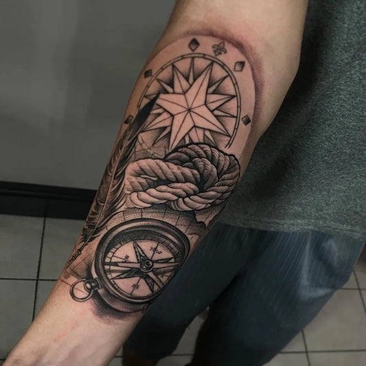 Big Black and Grey Compass Rope Feather Nautical Tattoo on Men Arm by @cris_element