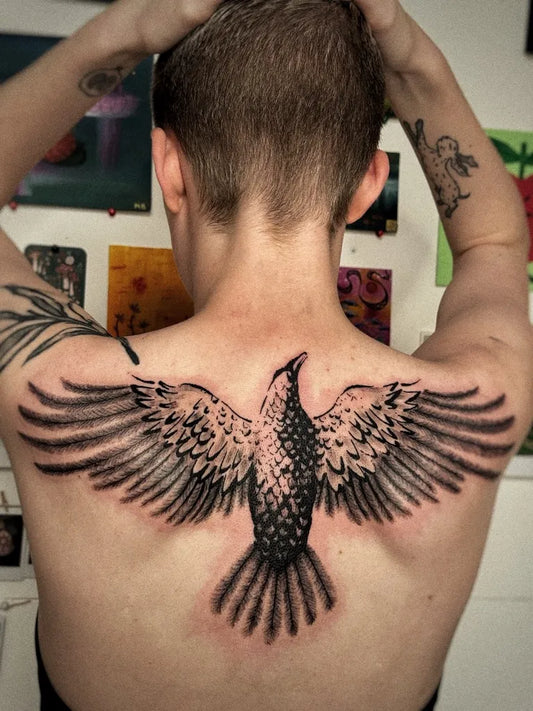 Big Black and Grey Crow Tattoo on Women Back by @m.a.i.a.tattoo