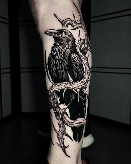 Big Black and Grey Crow and Branches Tattoo on Men Leg by @zebra_ink_