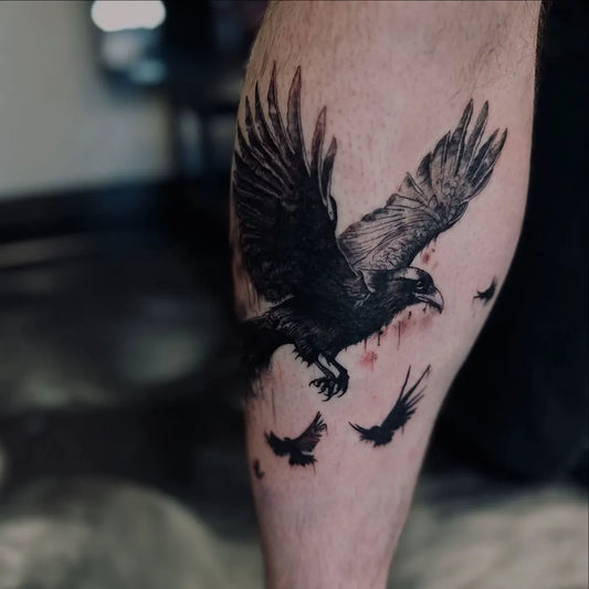 Big Black and Grey Crow with Blood Tattoo on Men Leg by @loren.tattoos