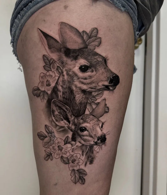 Big Black and Grey Deer with Fawn and Flowers Nature Tattoo on Women Thigh by @livtaylortattoos