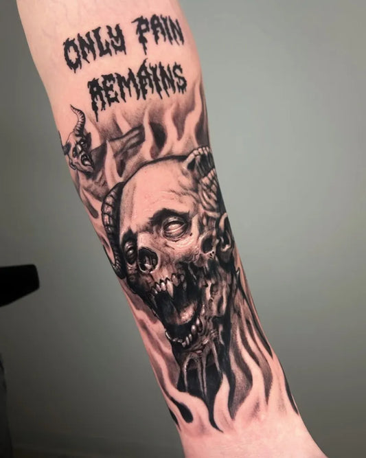 Big Black and Grey Demon Skull with Flames Tattoo on Men Arm by @pk_daniele_tattoo