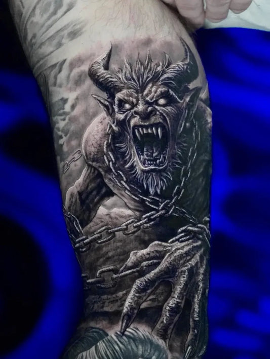 Big Black and Grey Demon in Chains Tattoo on Men Thigh by @inkeriatattoo_2