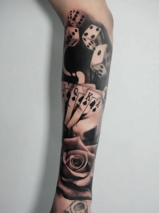 Big Black and Grey Dice Cards Rose Tattoo on Men Arm by @trussell_tattoo