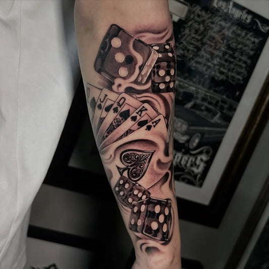 Big Black and Grey Dice and Cards Tattoo on Men Arm by @bigsammytattoo