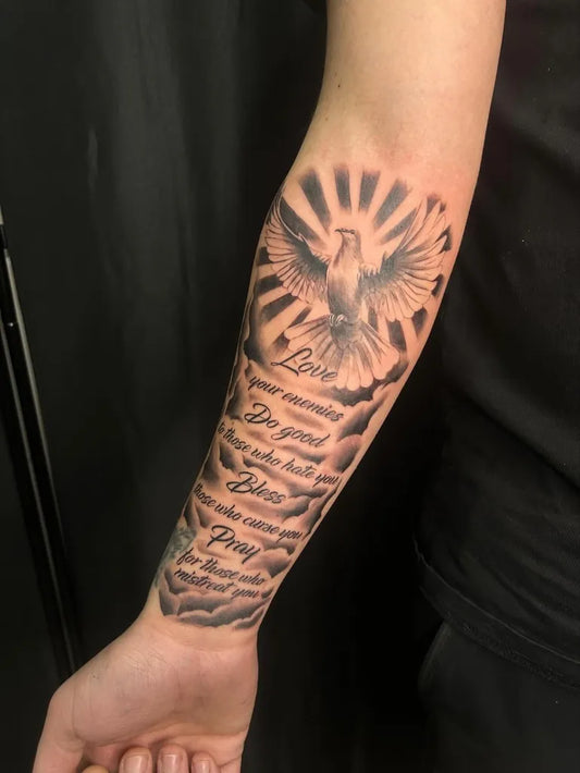 Big Black and Grey Dove with Prayer Text Tattoo on Men Arm by @epictattoosguildford