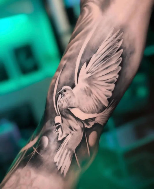 Big Black and Grey Dove with Stars and Branches Tattoo on Men Arm by @studio_myu