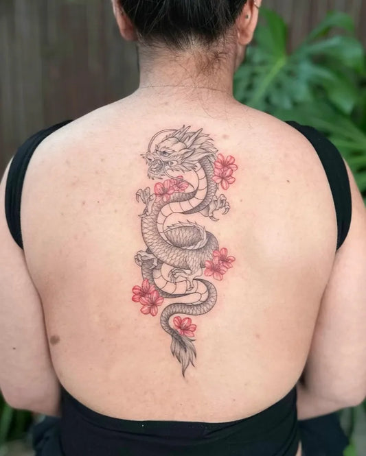 Big Black and Grey Dragon and Cherry Blossom on Women Back Tattoo by @nganvu.tattoo
