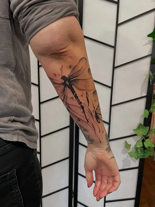 Big Black and Grey Dragonfly Wings on Men Arm Tattoo by @lindseynaspinski_tattoo
