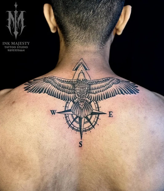 Big Black and Grey Eagle Compass Tattoo on Men Back by @tattoo_ink_majesty_taliparamba