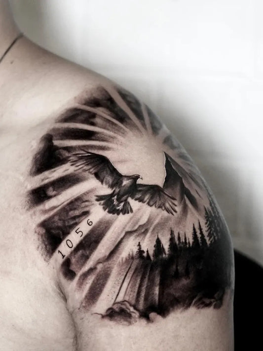 Big Black and Grey Eagle Sun and Trees Tattoo on Men Shoulder by @alexshimray