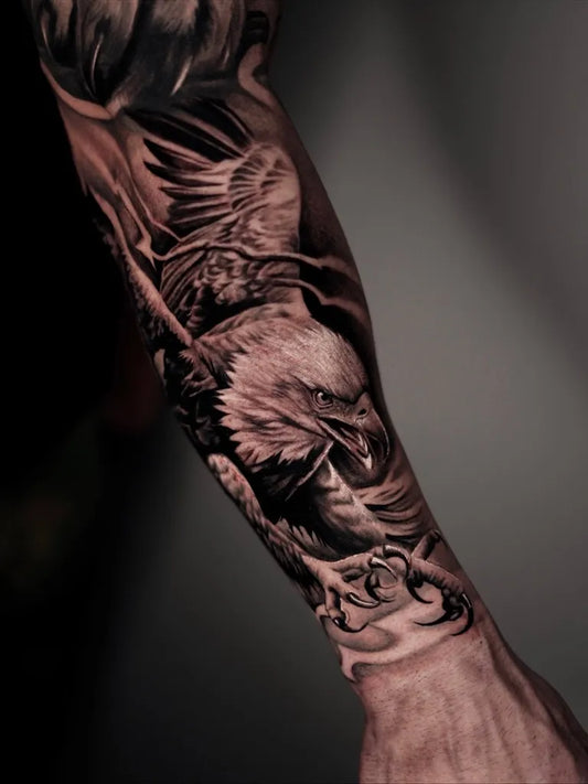 Big Black and Grey Eagle Tattoo on Men Arm by @melta.ttoo