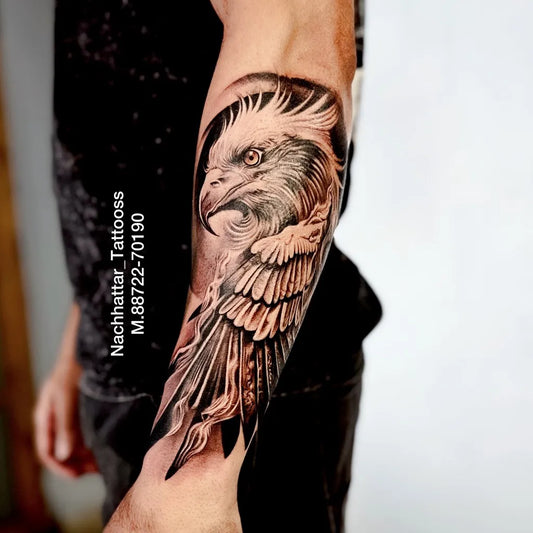 Big Black and Grey Eagle Tattoo on Men Arm by @nachhattar_tattoosss