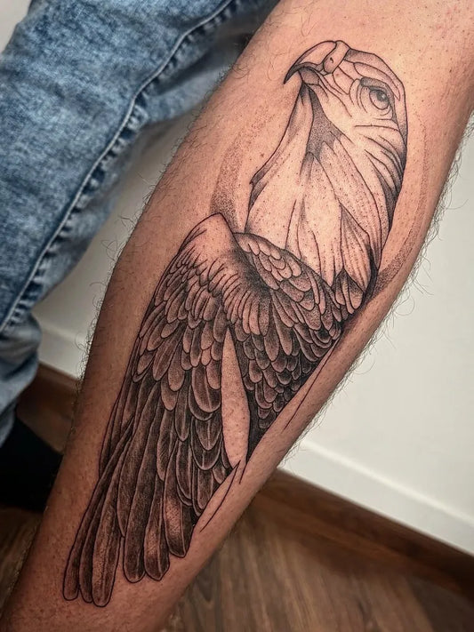 Big Black and Grey Eagle Tattoo on Men Leg by @mirage.tattoostudio