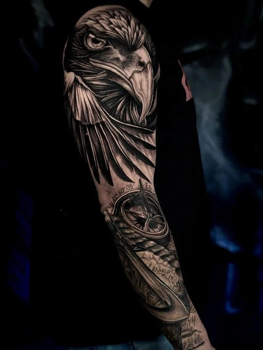 Big Black and Grey Eagle Wings Tattoo on Men Arm by @inkeria_tattoo