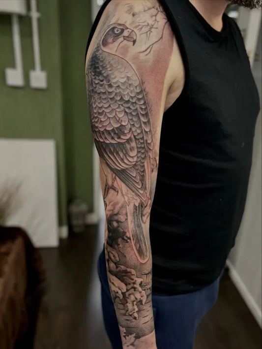 Big Black and Grey Eagle with Branches and Flowers Tattoo on Men Arm by @jacknealdraws
