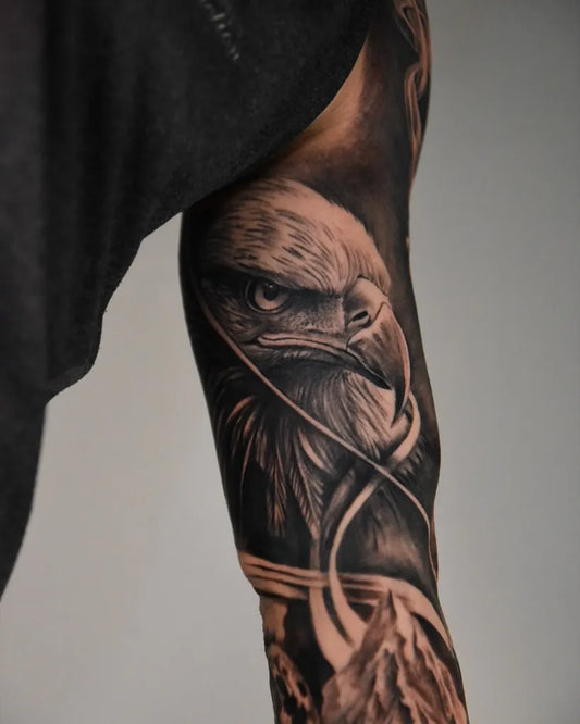 Big Black and Grey Eagle with Mountains Tattoo on Men Arm by @spacetats