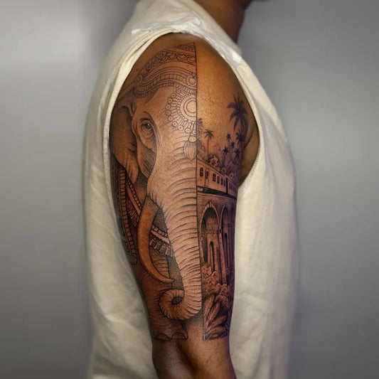 Big Black and Grey Elephant Palm Trees Archway Tattoo on Men Arm by @vikky_tattoo