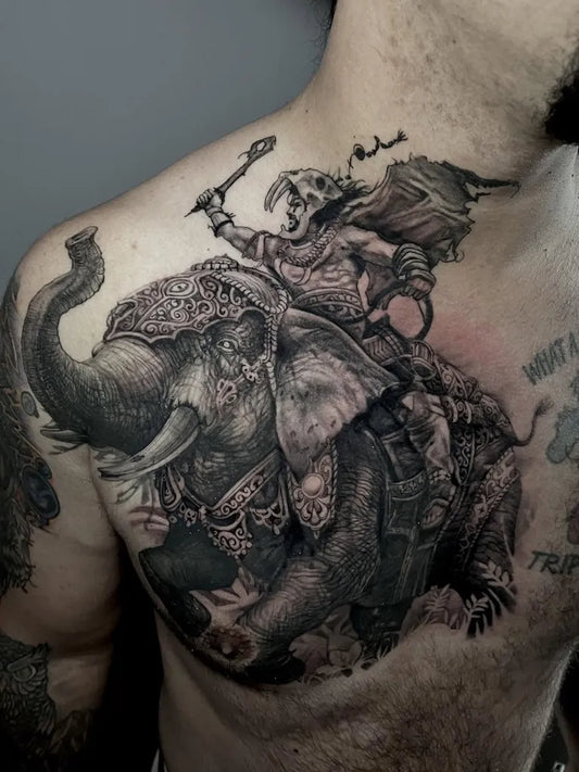 Big Black and Grey Elephant Rider Tattoo on Men Shoulder by @erinkraepel_tattoos