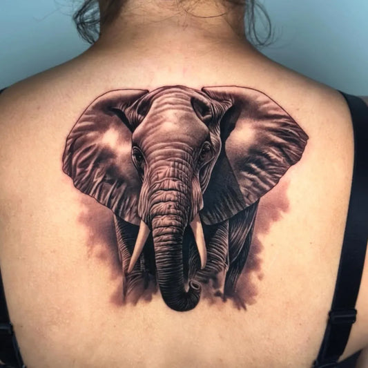 Big Black and Grey Elephant Tattoo on Women Back by @santa1santa