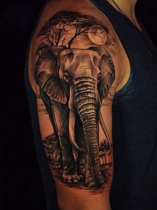 Big Black and Grey Elephant Tree Moon Tattoo on Men Arm by @disramos.ink
