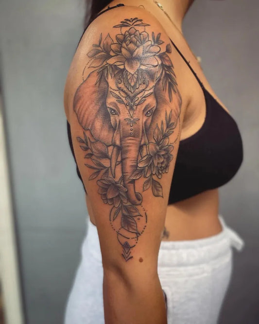 Big Black and Grey Elephant and Floral Tattoo on Women Shoulder by @heizenbird