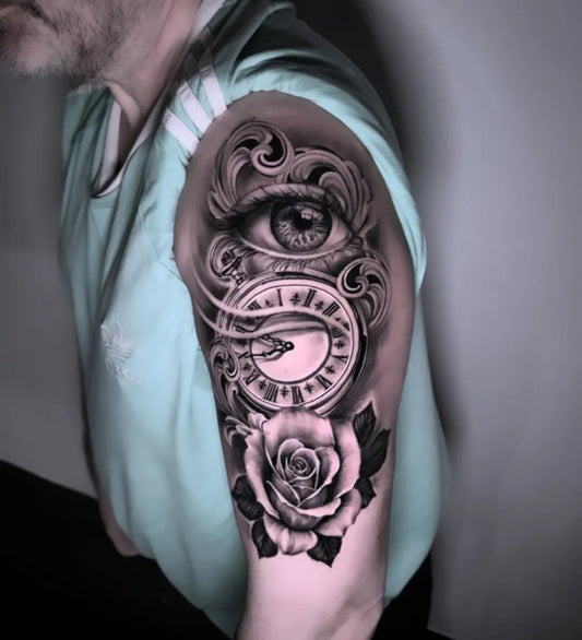 Big Black and Grey Eye Clock Rose Tattoo on Men Upper Arm by @vedicktattoo