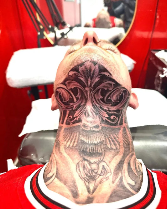 Big Black and Grey Floral Skull Tattoo on Men Throat by @tattoo.xtreme