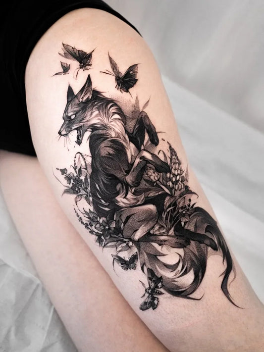 Big Black and Grey Fox with Birds and Flowers Tattoo on Women Thigh by @sonya_fakas