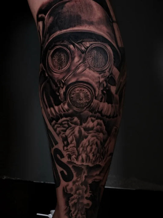 Big Black and Grey Gas Mask Beard Flames Military Tattoo on Men Leg by @servininkk