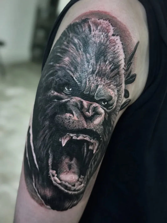 Big Black and Grey Gorilla Tattoo on Men Arm by @27.tattoos_