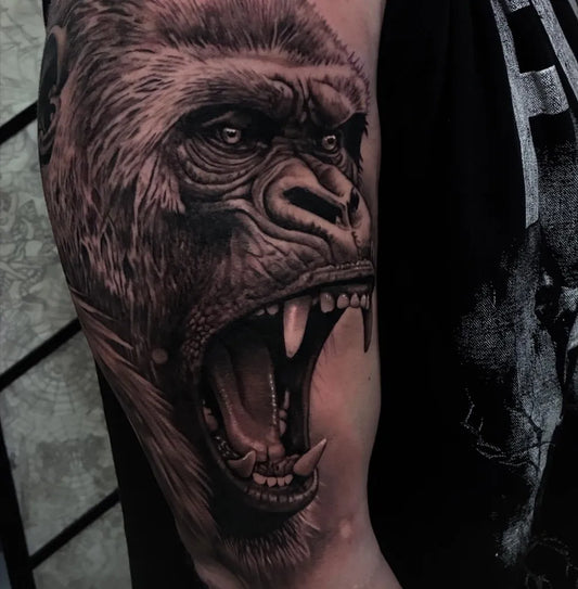 Big Black and Grey Gorilla Tattoo on Men Arm by @cheri_may_tattoos